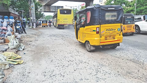 Loose gravel combined with dust on damaged stretch near Kalaimagal Nagar bus stop in Ekkattuthangal poses an accident risk