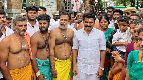 The minister visited the temple and offered prayers along with residents after the pathway was restored