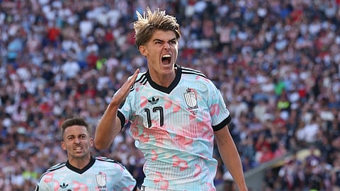 Belgium's Charles De Ketelaere (17) celebrates after scoring his side's opening goal during the World Cup round of 16 soccer match between the United States and Belgium in Seattle
