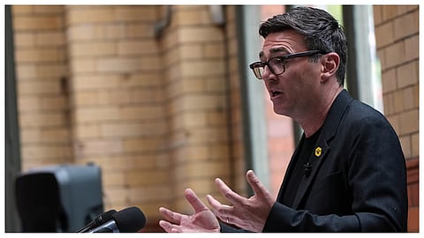 Labour Party's Andy Burnham delivers a speech at the People's History Museum in Manchester, England.
