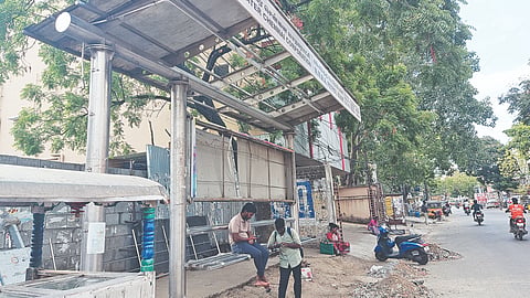 Bus shelter on Razzak Garden Main Road, Arumbakkam, has roof missing while the seats are placed unusually high