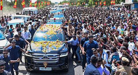 In this image received on July 10, 2026, Tamil Nadu Chief Minister Vijay's convoy arrives for the People�s Meeting Program as part of his first official visit to Karur after he took up the reins as Chief Minister, in Karur, Tamil Nadu.