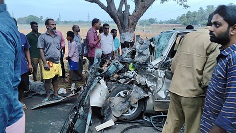 The completely mangled remains of the car