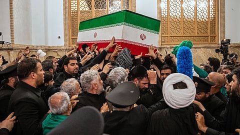 In this photo released by Iran’s Supreme Leader’s office, mourners carry the coffin of the late Iranian Supreme Leader Ayatollah Ali Khamenei above the crowd for the final prayer before his burial at the Imam Reza Shrine in Mashhad, northeastern Iran.