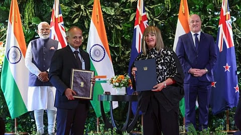 In this image received, Prime Minister Narendra Modi and New Zealand Prime Minister Christopher Luxon look on as delegates exchange Memorandums of Understanding (MoUs) between India and New Zealand, in New Zealand.