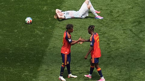 Spain's Lamine Yamal (19) and Nico Williams (17) celebrate in front of Belgium's Joaquin Seys (18) after the World Cup quarterfinal soccer match between Spain and Belgium in Inglewood, Calif., near Los Angeles, Friday, July 10, 2026.