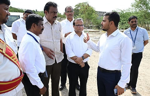 Collector inspects airport expansion site