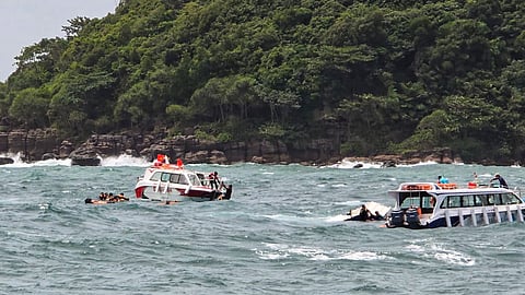 Rescue personnel carry out operations after a speedboat carrying Indian tourists capsized near Hon May Rut Ngoai off Phu Quoc Island, Vietnam