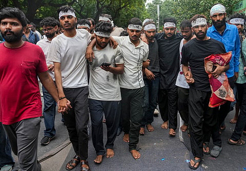 New Delhi: Supporters of the Cockroach Janata Party (CJP) at Jantar Mantar after activist Sonam Wangchuk, unseen, who has been on an indefinite hunger strike for 21 days, was shifted to a hospital for medical care, in New Delhi, Saturday, July 18, 2026.
