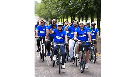 Union Youth Affairs and Sports Minister Mansukh Mandaviya leads participants during a cycle rally from the Collins fountain at Glasgow Green ahead of the 2026 Commonwealth Games, in Glasgow, Scotland, Thursday, July 24, 2026