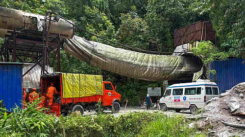 Officials present at the site after a tunnel under construction collapsed following an explosion of suspected methane gas, leaving at least 20 workers killed and five others trapped for over 24 hours, in Namchi district, Sikkim, Wednesday, July 22, 2026