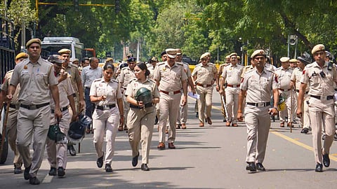Delhi Police personnel move towards Sansad Marg to maintain law and order amid the ongoing demonstration over the alleged NEET-UG examination irregularities, in New Delhi, Thursday, July 23, 2026