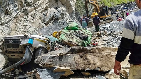 Wreckage of a vehicle after boulders fell on it from a hillside in the Pangi valley, Chamba district, Himachal Pradesh, Friday, July 24, 2026