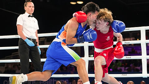 India's Jadumani Singh Mandengbam (blue) is declared the winner over Scotland's Aaron Cullen after their men's 55kg Round of 32 boxing bout at the Commonwealth Games 2026, in Glasgow