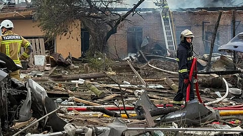 This photo provided by the Ukrainian Emergency Service, shows the site of Russian missile strikes in Kyiv region, Ukraine.