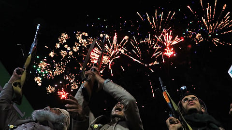 Fireworks burst as Houthi supporters rally against the Saudi-led coalition in Sanaa, Yemen.
