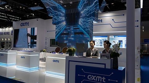 Workers at the booth for Chinese DRAM producer ChangXin Memory Technologies, also known as CXMT, wait for visitors at the 21st China International Semiconductor Expo in Beijing.