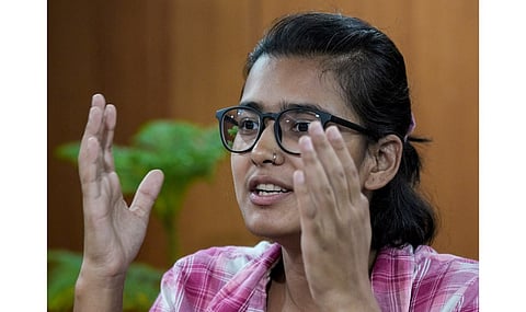 All India Students' Association (AISA) President Neha Bora during an interview with PTI