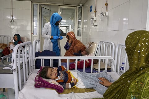 Afghan women care for their children in the malnutrition ward at Indira Gandhi Children’s Hospital in Kabul, Afghanistan