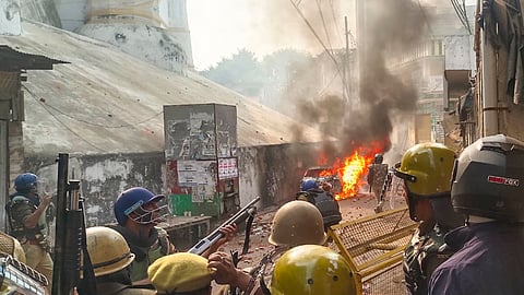 Police try to control the situation amid violence during a second survey of the Jama Masjid, claimed to be originally the site of an ancient Hindu temple, in Sambhal, Sunday, Nov. 24, 2024