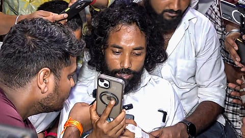 Leader of Opposition in the Jharkhand Legislative Assembly and BJP leader Babulal Marandi interacts with student leader Devendra Nath Mahato and other protesters staging an indefinite hunger strike