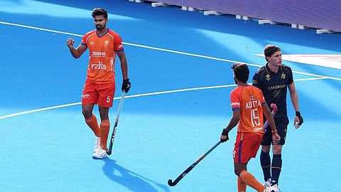 India's Abhishek, left, celebrates after scoring the opening goal during the World Cup Field Hockey, 7th and 8th place playoff match, between Belgium and India in Wavre, Belgium, Friday, Aug. 28, 2026.
