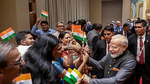 Prime Minister Narendra Modi being received by Indian diaspora in Uzbekistan during his two-day visit to the country, in Tashkent