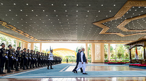 Prime Minister Narendra Modi being accorded a ceremonial welcome, in Tashkent, Uzbekistan. Uzbekistan President Shavkat Mirziyoyev is also seen.