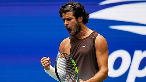 Carlos Alcaraz, of Spain, reacts during a match against Roman Safiullin, of Russia, during the first round of the US Open tennis championships