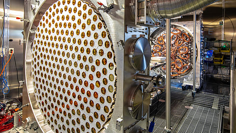 In an undated image provided by Matt Kapust/Sanford Underground Research Facility, Photomultiplier tube arrays being prepared for the LZ Dark Matter Experiment at the Sanford Underground Research Facility in Lead, S.D. A lone signal from an experiment in South Dakota doesn’t fit the profile of any other known particles, physicists say