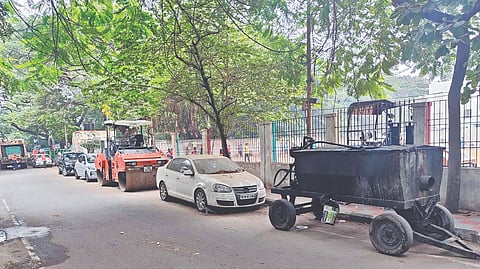 The vehicles parked on the street, reducing available space