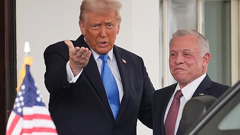 President Donald Trump greets Jordan's King Abdullah II at the White House