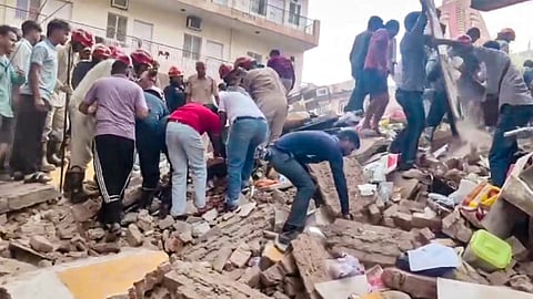 Rescue operation underway after a building collapsed at Satya Niketan area