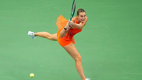 Aryna Sabalenka, of Belarus, returns the ball to Taylor Townsend, of the United States, during the fourth round of the US Open tennis championships