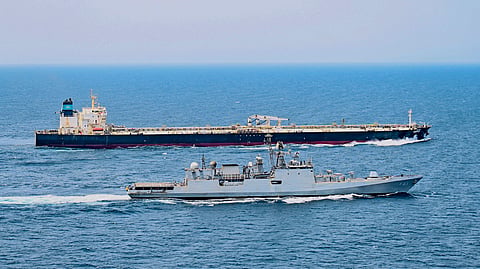 Indian Navy frigate INS Trishul (F43) escorts crude oil tanker MT Compass safely through the high-risk area in the Bab-el-Mandeb strait between the Red Sea and the Gulf of Aden.