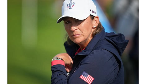 Angela Stanford United States captain watches play from the 10th fairway during the Solheim Cup in Den Bosch, Netherlands