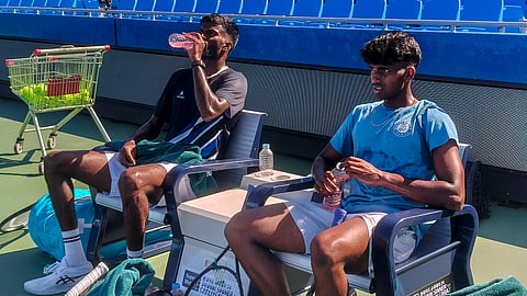 India's tennis players Dhakshineswar Suresh, left, and Manas Dhamne during practice for the Davis Cup tie against South Korea, in Seoul