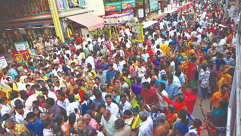 A massive crowd of devotees on one of the Chithirai streets in Madurai on Thursday
