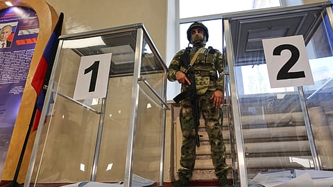 Ballot boxes are seen at a polling station during the parliamentary election in Donetsk, in the Russian-controlled part of the Donetsk region, Ukraine