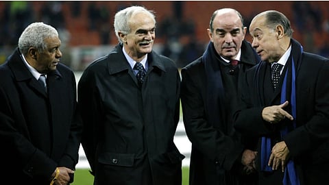 Inter Milan’s former players Sandro Mazzola, second left, with Jair of Brazil, left, Mario Corso and Luis Suarez, right, prior to the start of the Champions League first knockout round, second leg soccer match between Inter and Ajax at the San Siro stadium in Milan, Italy, March 14, 2006.