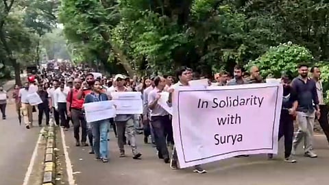 Faculty members of the Indian Institute of Technology (IIT-Bombay) hold a march in the institute's campus to support Suryanarayana Doolla, who was removed as Dean of Administrative Affairs amid protests by students over the suicide of a 22-year-old student