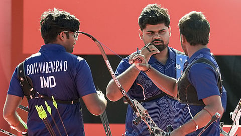 India's Dhiraj Bommadevara, Yashdeep Bhoge and Neeraj Chauhan during the men's recurve archery team semifinal event against Iran at the 20th Asian Games, in Okazaki, Aichi, Japan.