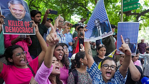 Activists during a protest organized by various student bodies, including AISA, SFI, and NSUI, demanding the resignation of Chief Election Commissioner (CEC) Gyanesh Kumar over alleged irregularities in electoral rolls, at Jantar Mantar