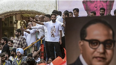 Cockroach Janta Party (CJP) founder Abhijeet Dipke waves to supporters during a protest by CJP against Chief Election Commissioner (CEC) Gyanesh Kumar, demanding his resignation, at Shivaji Park, in Mumbai.
