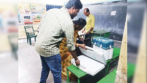 Election officials setting up a polling booth in Madurantakam on October 5.