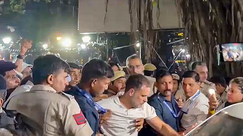 LoP in the Lok Sabha Rahul Gandhi being detained by police personnel after over eight-hour sit-in inside Akashvani Bhawan premises for not being allowed to march towards the Election Commission's office