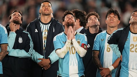 Lionel Messi and teammates watch drone show after his final match.