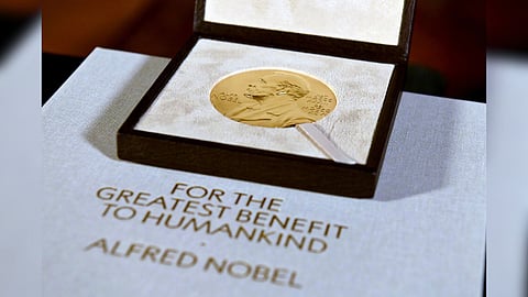 A Nobel diploma and medal are displayed, during a ceremony in New York.