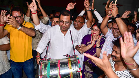 BJP MLA Rupak Sarmah along with supporters celebrate after the party's victory in the Nagaon by-elections, in Nagaon district