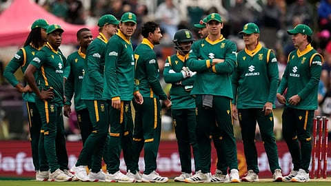 South Africa’s players watch an LBW appeal review on a big electronic screen during the third one day international cricket match between South Africa and Australia, in Potchefstroom, South Africa.